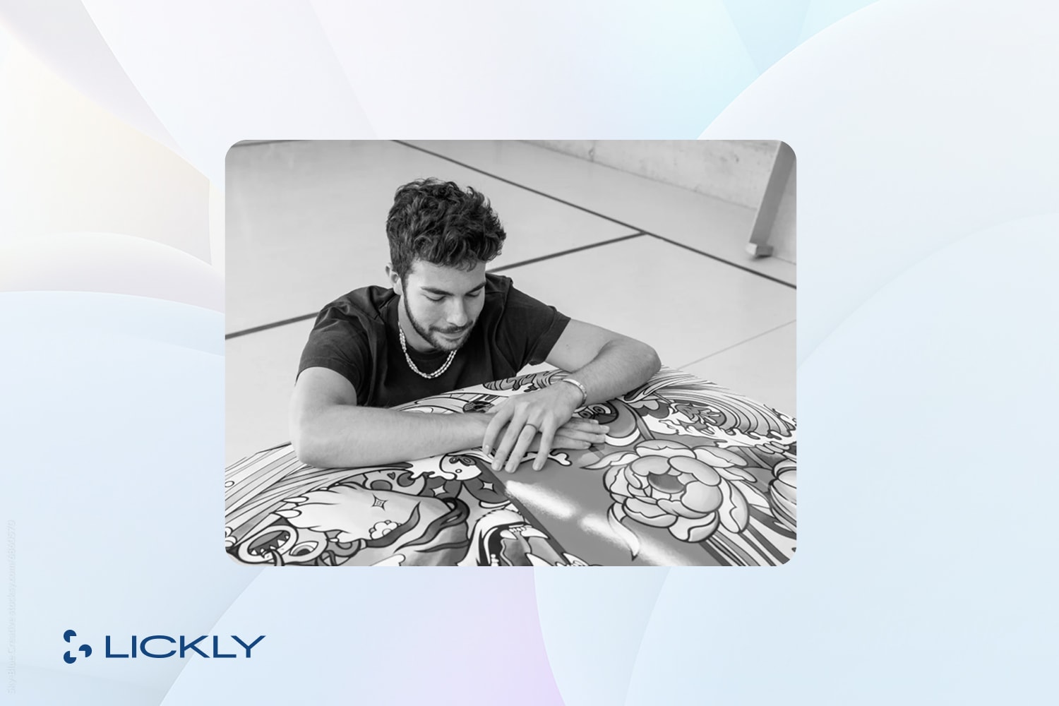 Lickly logo with man viewing art.